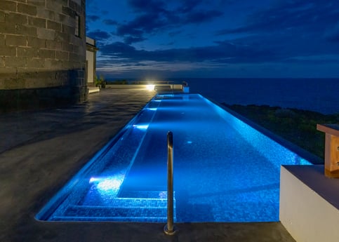 Infinity pool by night with amazing view