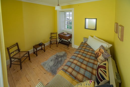 The yellow bedroom is also ensuite