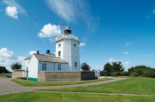 The lighthouse set in beautiful surroundings